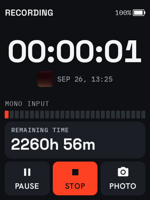 The recording screen: elapsed time, the title with its first photo's thumbnail, the MONO INPUT level meter, remaining time, and PAUSE, STOP and PHOTO buttons